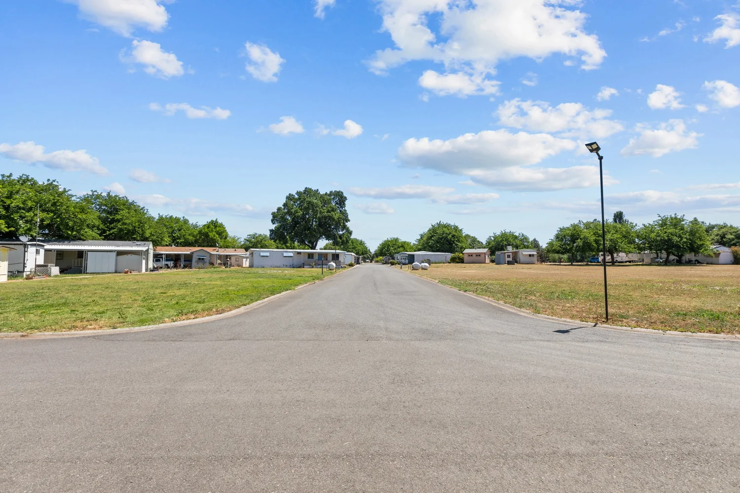 RV space with full hookups at New Orchard Estates